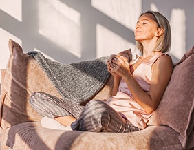 Patient in Tyler resting after getting dental implants